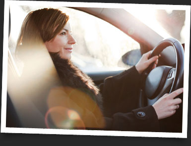 Woman driving using Ohgo